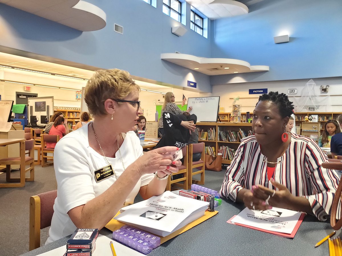 Ayden Elementary 4th Grade teachers,  students, and parents reviewing some of the most difficult math standards, and they made it fun... Thank you Heidi Criswell for coming out to help tonight. Great job to all who paticipated!