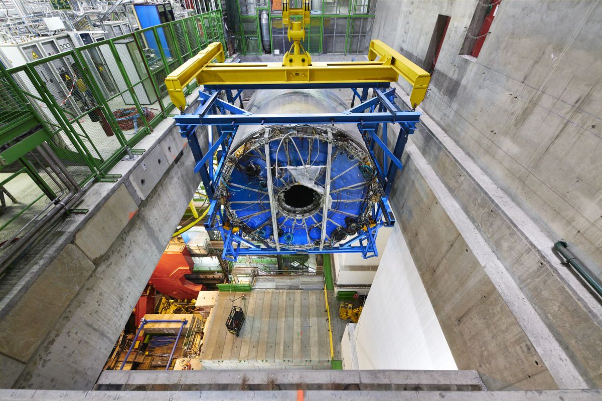 CERN's tweet photo. 📸 Our #PhotoOfTheWeek shows the @ALICEexperiment's time projection chamber (TPC) being lifted from its underground home.

Read more about the changes to the ALICE experiment as part of #UpgradingLHC: https://t.co/htpnIjVOvw https://t.co/xqMWQWHDAQ