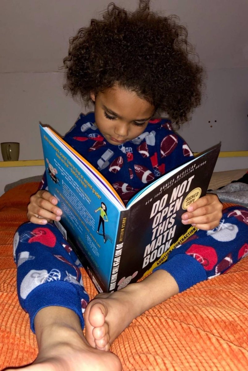 danicamckellar's tweet photo. Love it when you guys send pictures of your little ones with my @mckellarmath books! 😍 And OMG those toes!! 
#DoNotOpenThisMathBook ages 6-8 
https://t.co/5MsBv2jgHi (Or TODAY ONLY until 5pm PDT call 818.248.9668 for a personalized signed copy - ask for Jessica!) https://t.co/37sciU5QEb