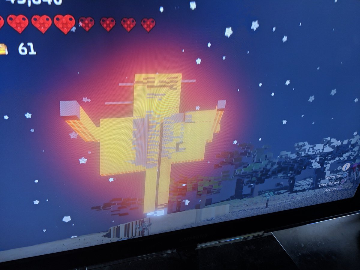 KatiePax's tweet photo. @stampylongnose Gus (7 years old) spent 2 days working on a giant Stampy Cat Lego Worlds statue! He really hopes you like it! https://t.co/hX4H32P7fj
