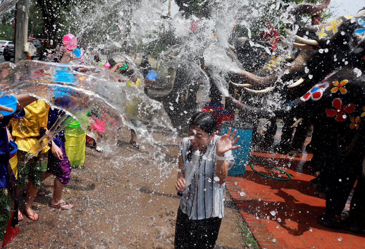 People splashed around with elephants to greet the water festival of #Songkran, which marks the start of the Thai New Year in Ayutthaya, Thailand.