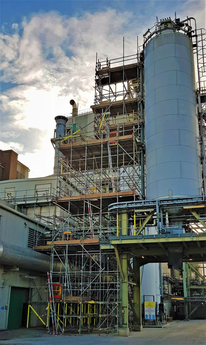 Tube and fitting design providing access for maintenance works at a power station based on Wilton International, Teesside.  The scaffolding is ground founded, with the upper section based off the steelwork supporting the vessel with minimal tie locations.