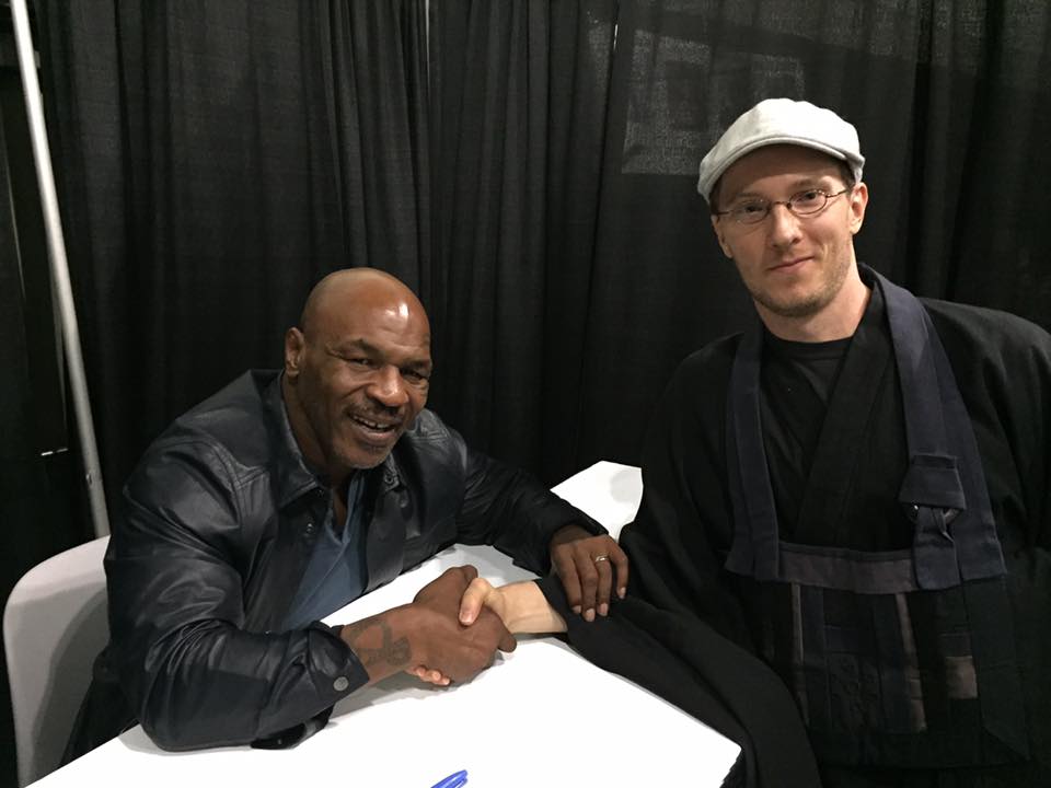 rylendgrant's tweet photo. My 2nd and current teacher photo on the @AngelCityZen website... taken the day I taught @miketyson how to meditate.
.
.
#miketyson #punchout #ironmike #ironmiketyson #hardcorezen #aczc #zen #angelcityzencenter #bradwarner #rakusu #zenmonk #DSLA #dogensangha #dogensanghalosangeles https://t.co/xrY3x6l6ms
