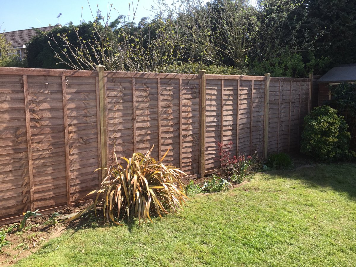 Overlap panels on wooden posts with post caps #fencing #BerkshireBoundaries #RdgUk #Woky #DirectoryofExcellence