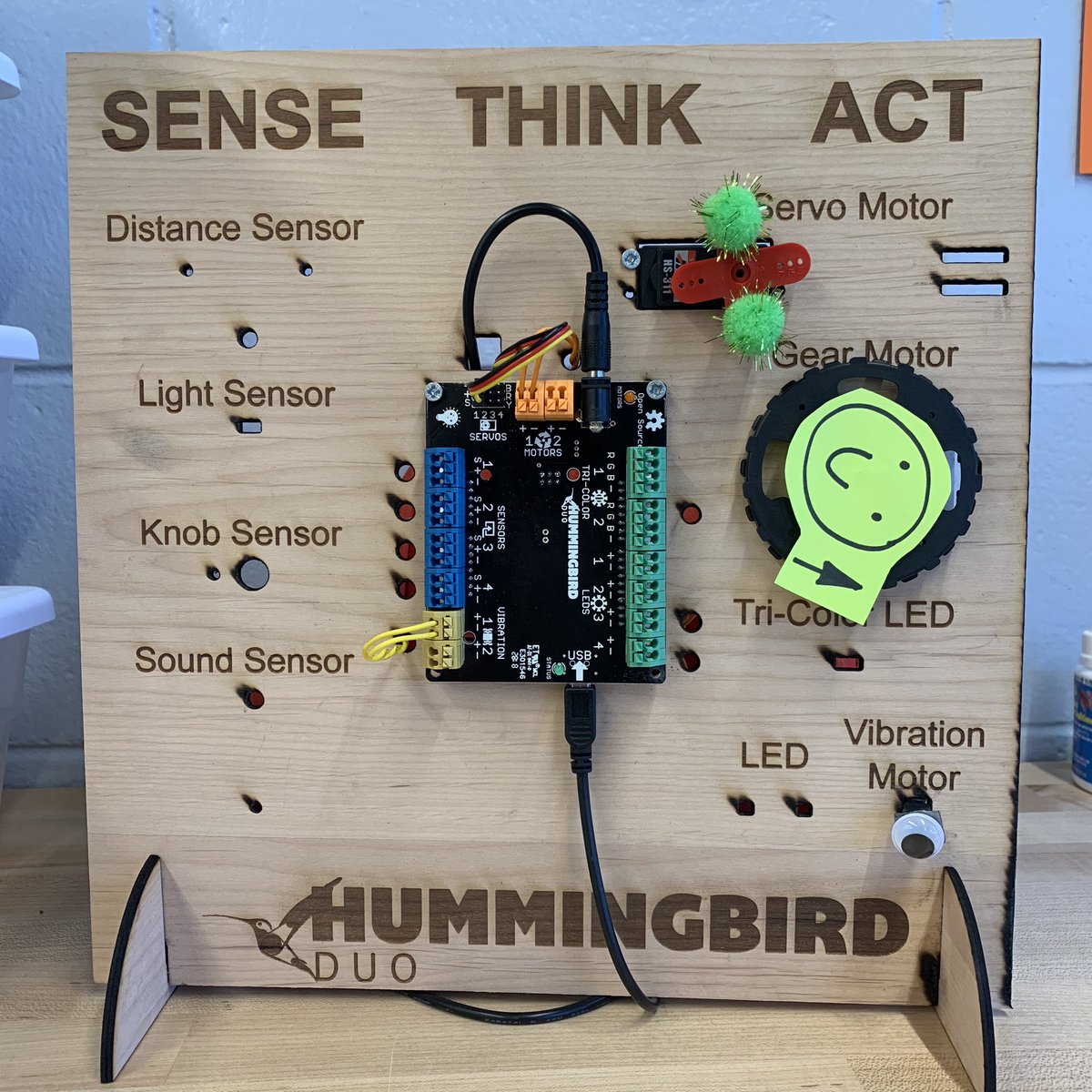 robertabrandao's tweet photo. Thank you @birdbraintech for the awesome starter file to create a Sense-Think-Act Demo Board using our laser cutter “Sparky”. Our 3rd graders are loving it. We are assembling it together. Here is v1.0: board+3 motors https://t.co/ZUXJSQFjyW