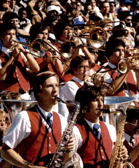 DiamondMClub's tweet photo. Your @SMU_MustangBand playing in the stands, from the 1980 Rotunda. #buzzemup #redvest #tbt https://t.co/KZCU94Gsg8