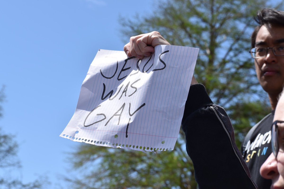 bayswanto's tweet image. Students responded to the street preachers signs with some of their own.