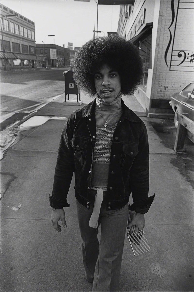 shannonhilson's tweet photo. A 19-year-old Prince walking the streets of Minneapolis, 1977. (Photo Credit: Robert Whitman) #YasKing #BlackPeopleMagic #MusicalGenius #PersonalIdol https://t.co/wzE9RQcwGI