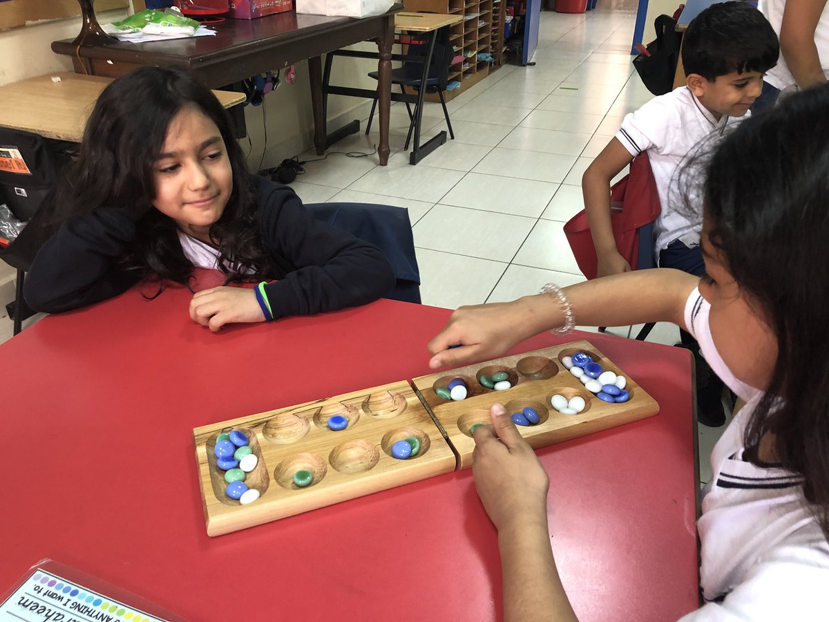 #Playing games in Ms. Cassie’s class during Desert day @AISQ8official . Kids had a great time, and I learned how to play #Mancala! #alwayslearning #disguisedmathfun #grade1 #
