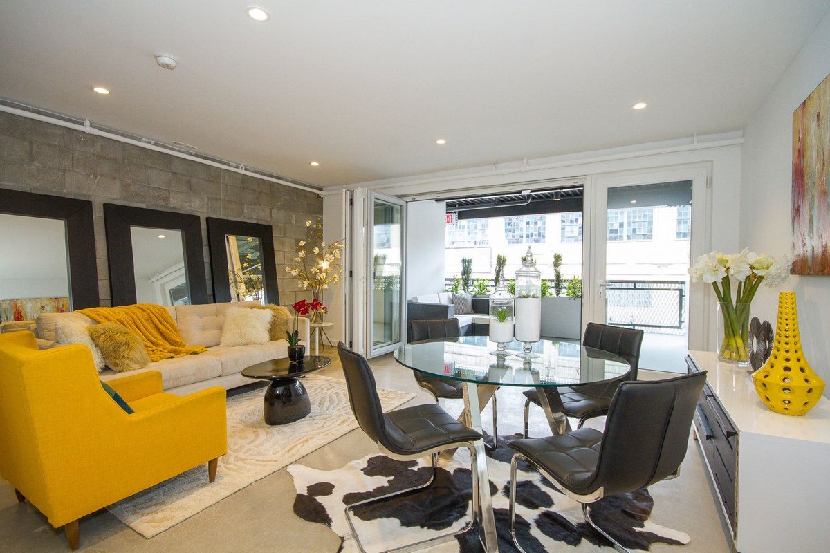 Talk about a bold vision! Time to open your balcony doors to bring in Spring fever! Say hello to vibrant accents throughout the home. 😎☀️ #HELLOTBT #HELLOWashington #618WashingtonAve #InteriorDesign #2014 #YellowAccents #SpringDecor #FlowThrough #SpringSeason