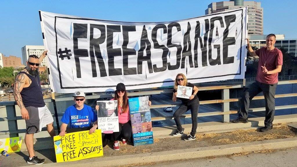 itwaschris's tweet photo. Protest the Ecuadorian &amp; British embassies worldwide Donate to #Wiklleaks #JulianAssange 's legal defense 
https://t.co/R0bSmgFNGE #FreeAssange #P2 #tlot #Anonymous #Q #QAnon #freeeech #FirstAmendment #USpolitics #BernieSanders #Green #ACLU https://t.co/FfkTGiFM9Y