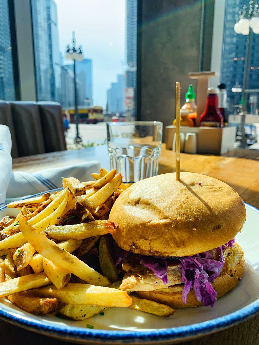 Grab a seat by the window and enjoy your meal in the sunshine ☀️ 
#landandlakechi #chicagorestaurant #dinner #buffalochickensandwich