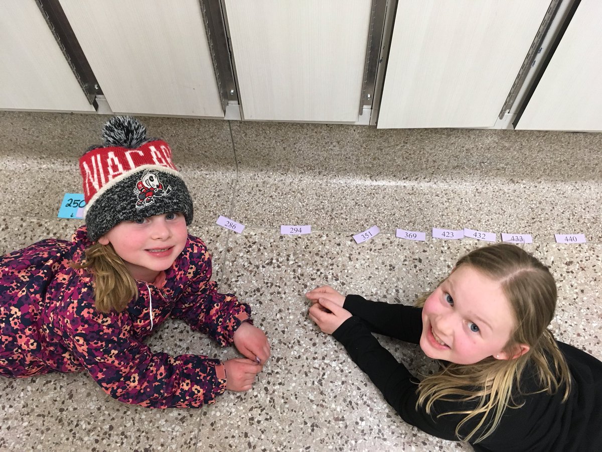ZKorody's tweet photo. Placing numbers on the number line at the @JsvSauve family fun night. #dsbn #dsbnmath https://t.co/sJ2qkpr2xj