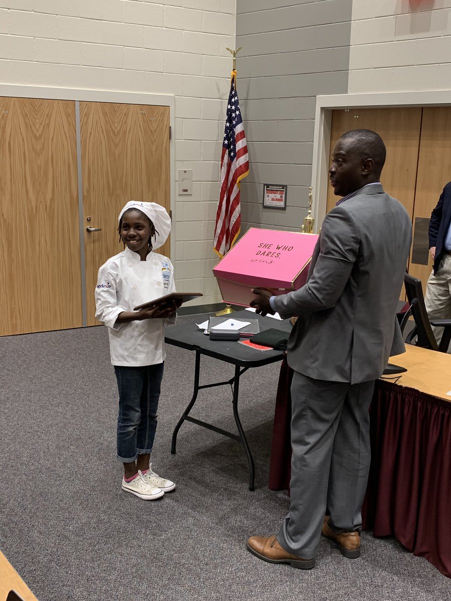 cville_schools's tweet photo. Chef Ulysse Charles is celebrating the winner of the recent Sodexo Future Chefs competition, Makayla Young from Bailey Station Elementary School.  Makayla is also a regional winner and in the running for the national competition.  Congratulations!!! @ChefUlysse  @BaileyBears05 https://t.co/Z2nNNbdkOE