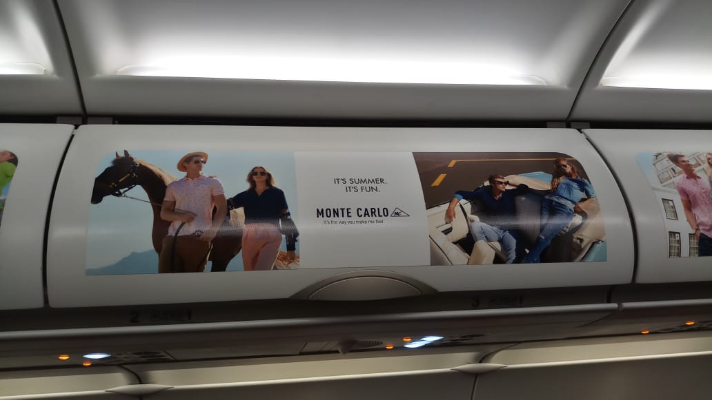 Atin_OOH's tweet photo. Monte Carlo showcasing their gorgeous Summer Collection across the Overhead Bins of @AirAsia_IN Perfectly sized media, visible throughout the duration of the flight, used as a storyboard to display different creatives on each bin. #HighRecall #AirlineAdvertising @montecarlostyle https://t.co/1lBVpU1nM8