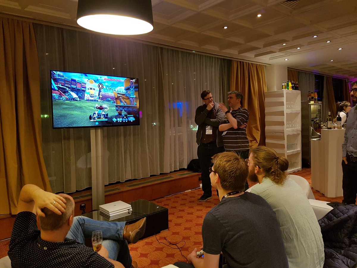 CoconutLizard's tweet photo. Coconut Lizardโers Steve, Will and Luke sat to play #switchbladegame at @UnrealEngineโs #UnrealFest ... thanks for keeping them entertained, @LucidGamesLtd ! https://t.co/sccuQyWYxR