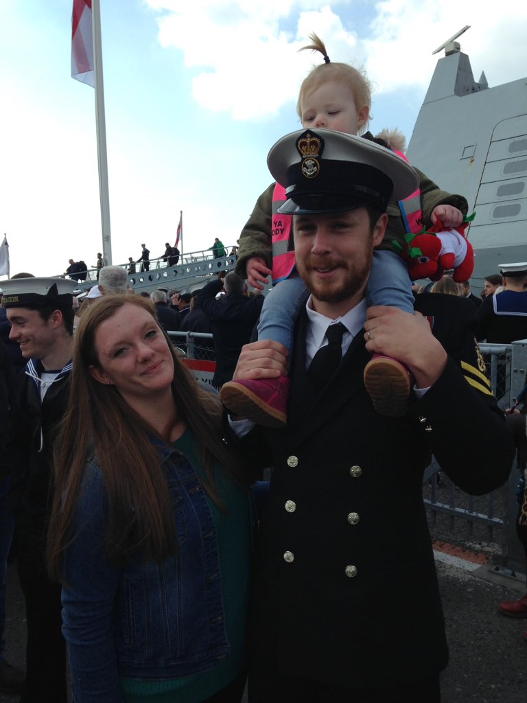 GHR_SouthCoast's tweet photo. Reunited:  #HMSDragon crew member Simon Perry is greeted by wife Zoe and daughter Aurora https://t.co/lJYxeF39yg