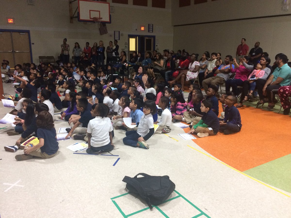 NationsFordES's tweet photo. Celebrate Scholars??? I believe we will. 🏆📈📙💫🎉 Kindergarten Q3 ceremony underway with scholars and families! @CharMeckSchools https://t.co/XLlUgzzLsR