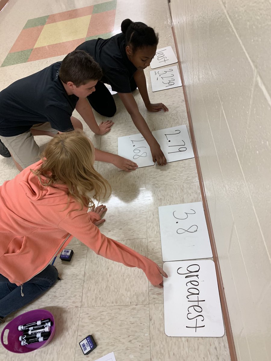 MrsWilbert1127's tweet photo. Teamwork comparing and ordering decimals! Listening to their conversations allowed me to hear what they still needed help understanding! LOVED this activity!! #teamwork #mathtime #visuals #nopencilandpaper @Proud2BeAtPride Proud2BeAtPride https://t.co/Ws5eOvwRVJ