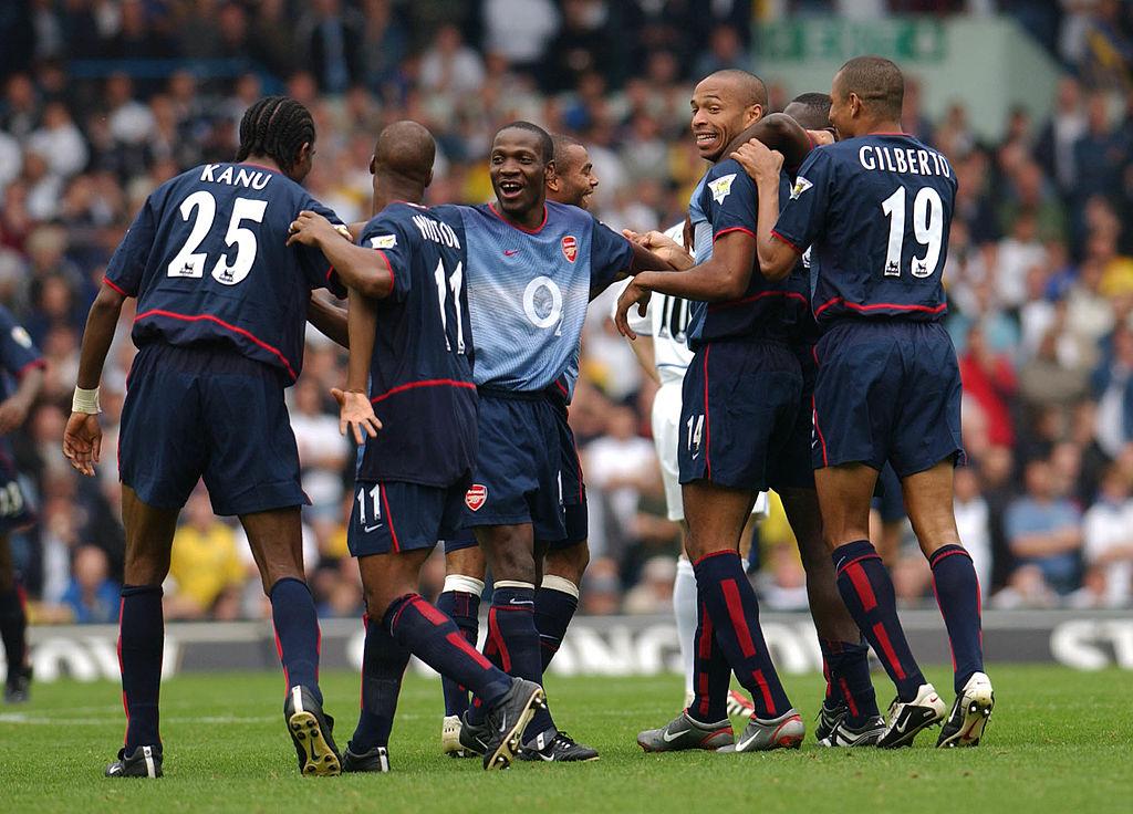 ThrowbackAFC's tweet photo. Arsenal were the first English club to field 9 Black players: Cole, Campbell, Lauren, Toure, Vieira, Gilberto, Wiltord, Henry and Kanu. (September, 2002) https://t.co/zjidLvLXoz