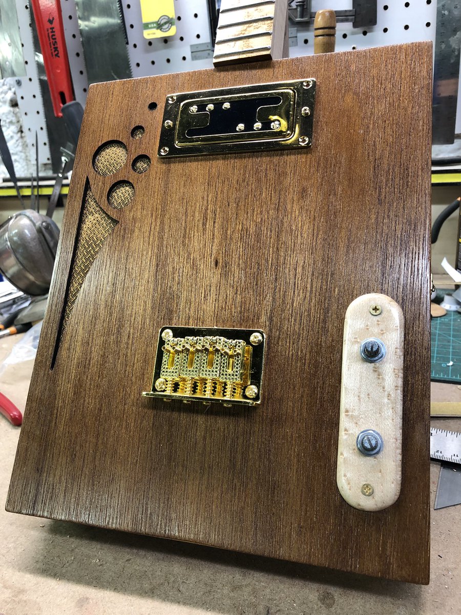 KimmerOh's tweet photo. I’ve been taking my time with this one. She’s in that almost nearly pretty much done soon state but couldn’t help but take a pic. #cigarboxguitar https://t.co/MqVamzfuBM