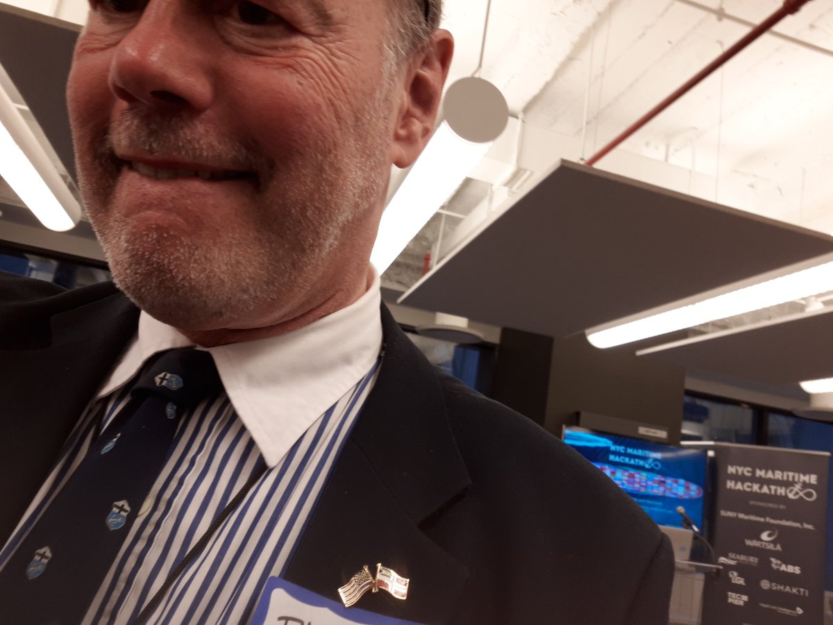 freightboy1's tweet photo. @NicGoodmaritime check out LR tie. Sitting w @Michael_Angell at @nycmaritimehack #hackmaritime https://t.co/8uOoCJEFS7