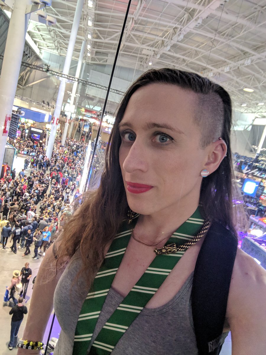 DameSabriel's tweet photo. I'm an out and proud trans woman who works in gaming and esports.

In honor of it being #PAXEast weekend, here are a few shots of me at PAXes past and present. #TransDayOfVisibility https://t.co/fPFt7U0aAm