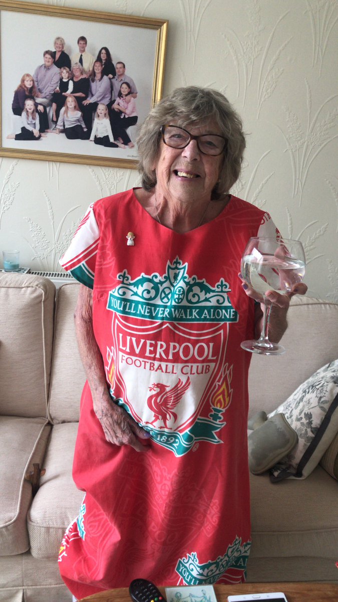molwood_x's tweet photo. Meet Nana Mave, we watch every Liverpool match and she wears her unique Liverpool dress. She’s battling cancer and we would love to get her to a home game and to meet some of her favourite players!! @LFC @MoSalah @JamesMilner @JHenderson @VirgilvDijk #liverpool #getmavetothematch https://t.co/AaMplcOI9X