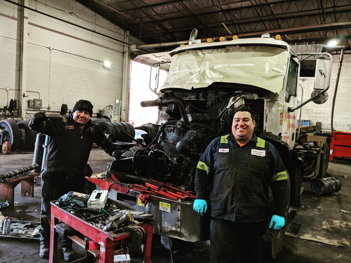 CountywideNY's tweet photo. Our shop mechanics Gilberto and Silva rebuilding the engine of one of our rolloff trucks. https://t.co/douBod82MK