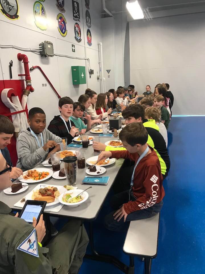 SaralandSchools's tweet photo. A field trip like NO other! An immersive learning adventure aboard a simulated aircraft carrier w theme-park style thrills surrounded by adv tech, flight simulators &amp; VR games! Tonight, 27 @SaralandMiddle Spartans eat 1st meal w their squadrons at P’cola National Flight Academy. https://t.co/iqBJ8tTBUN