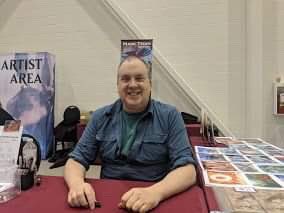 medina_irl's tweet photo. I have to give a SHOUT-OUT to @kytmagic for being such an awesome friend. In the middle of doing coverage for #mfcalgary he stopped by Mark Tedin’s table to pick up a Ponder playmat for me!! ❤️❤️❤️ 

With this sweet shadow sig! https://t.co/2p80agCoHe