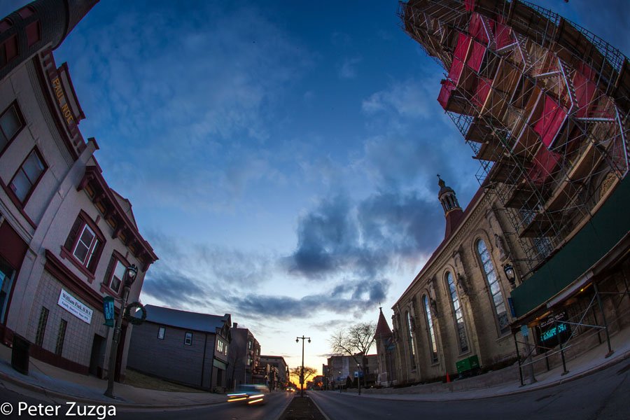 PeterZuzga's tweet photo. Sunset on Mitchell Street from 5th Street and Saint Stanislaus Catholic Church in #Milwaukee #Wisconsin today. #MitchellStreet #sunset #historic #church #catholic #photography #architecture #StreetPhotos #urban #cityscape https://t.co/kUvMEG6AhM