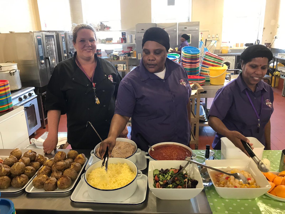 Our New In House School Meal offering starts today, devised in cooperation with our children. Pictured are our lovely Catering Team resplendent in their new Conway uniforms and  our new serving ware. #schooldinners #healtyeating