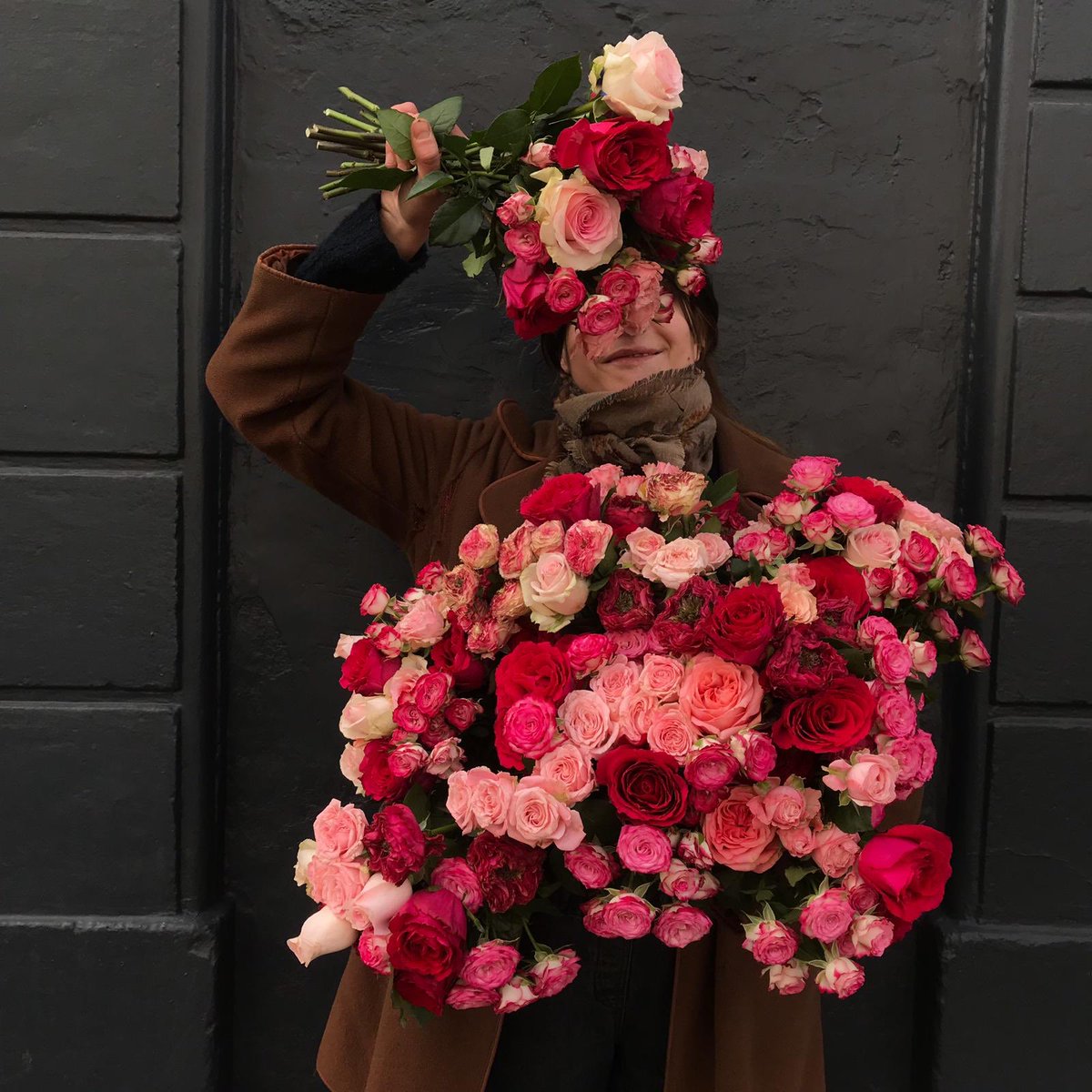 What a whirlwind of a weekend. This is our gorgeous florist Sarah who amazingly is still standing! Modelling our wee bunches of roses that we are selling today at a snip.