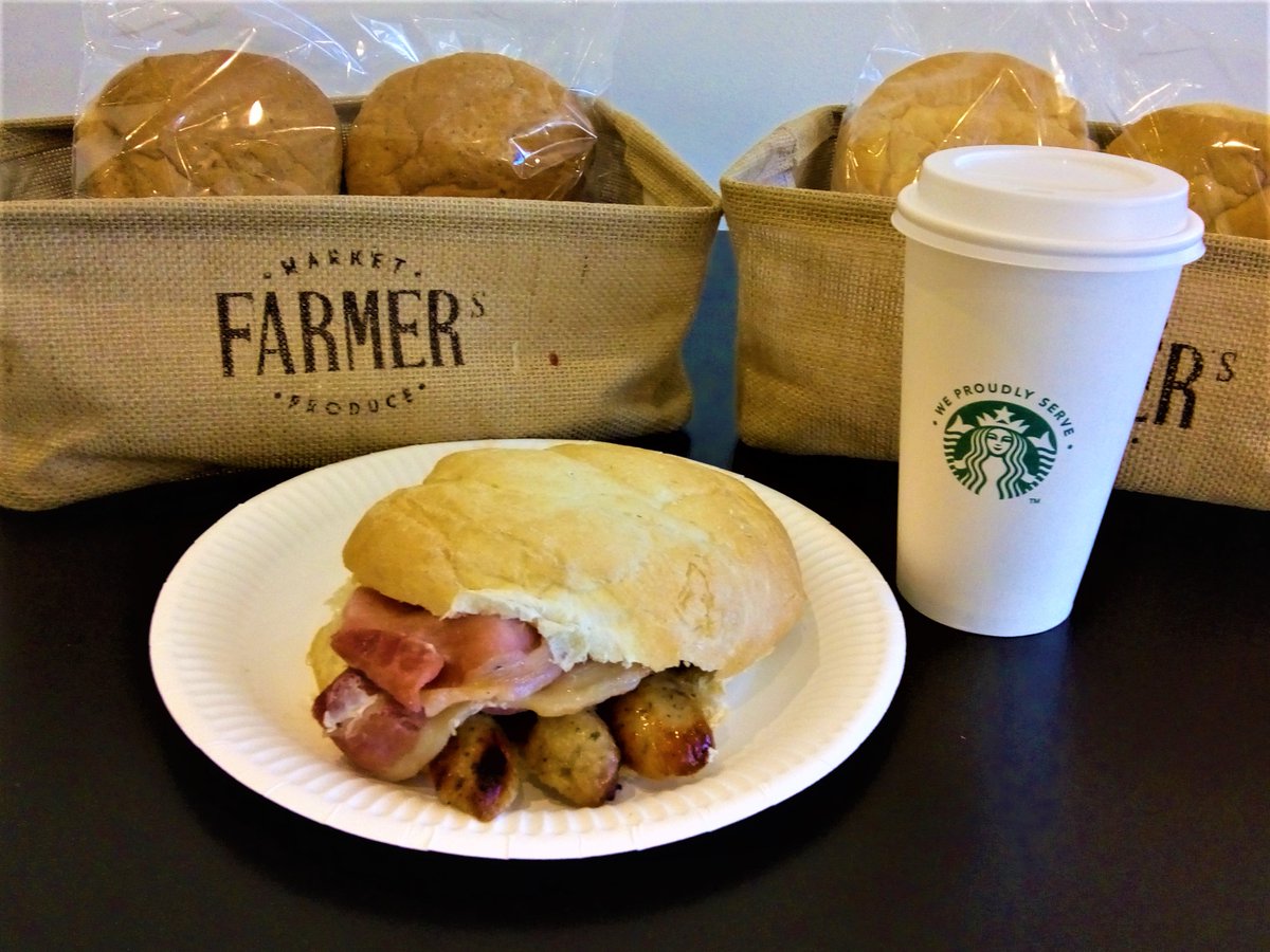 AscentCafe's tweet photo. This is no April Fool! Serving our Breakfast Deal daily - 2 pieces of bacon & 2 sausages in a bap PLUS a Starbucks medium Americano, Latte or Cappucino for just £3.75 Located in Ascent 2 #FarnboroughAerospaceCentre #aprilfool #proudlyservingstarbucks #breakfat #starbucks #Coffee https://t.co/NbnMXhqure