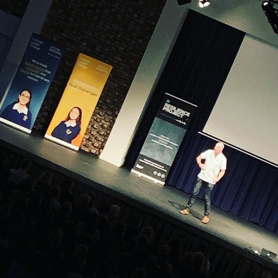 CLCEltham's tweet photo. Martin Heppell from The Resilience Project has hit the stage to a full house. Over 750 parents coming to watch this brilliant Parent Workshop, what a brilliant night. #unlimitedpossibilities #clcspirit #clcsisterhood #clccommunity https://t.co/Io5sanXYwz