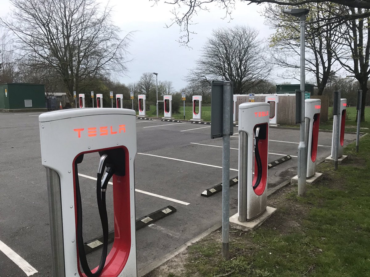 Tesla Supercharger at Charnock Richard services M6, UK 🇬🇧 2 of 12 plugs updated to include CCS.