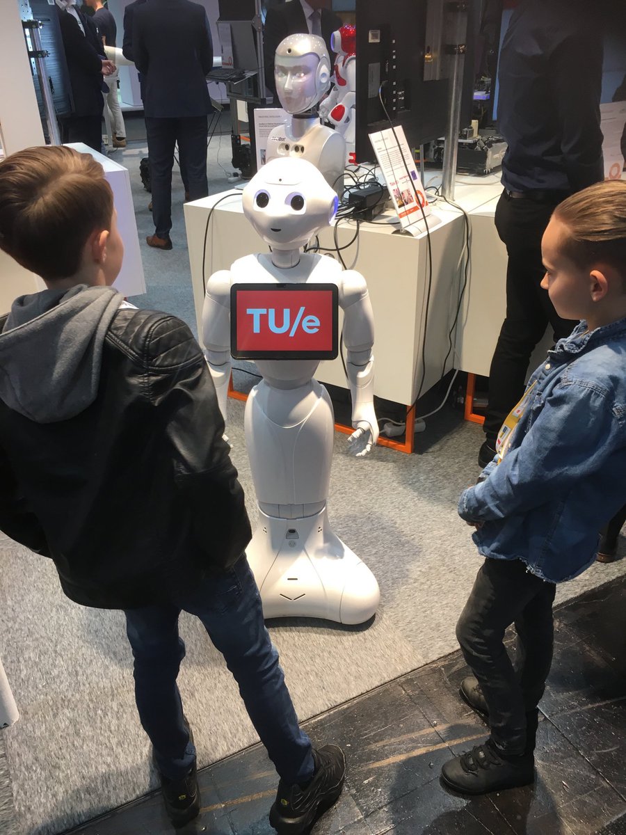 Psych_Tech's tweet photo. Our Pepper robot making new friends at the Hanover Messe #hanovermesse #socialrobotics @4TU_HT @Center_HT @TUeindhoven https://t.co/0x6c263R4y