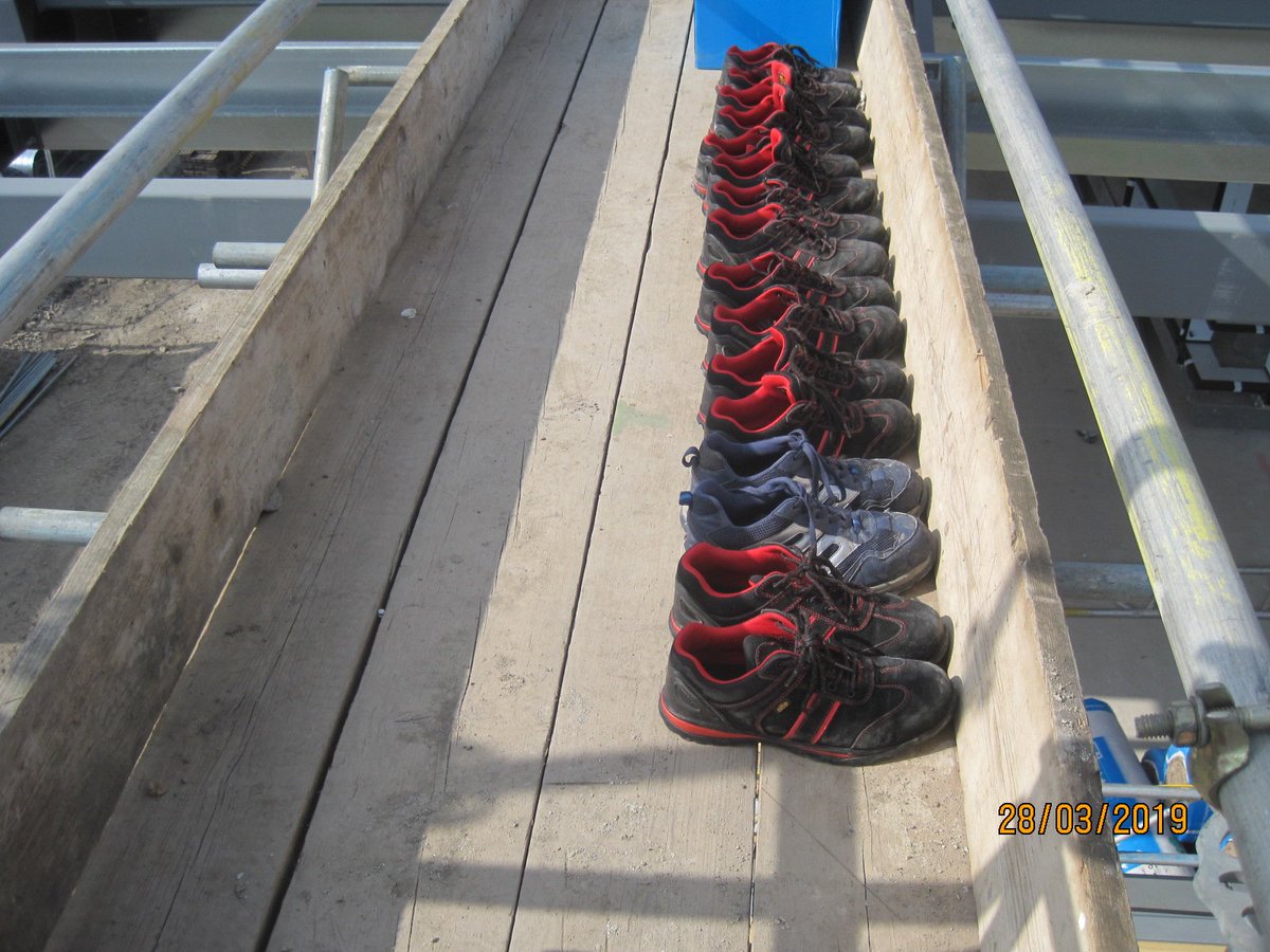 GaleConstLtd's tweet photo. #Mercedes #Dartford roofing gang changing to safety training shoes at top of the roof access tower to keep the @KingspanIP_UK #KingZip roof panels clean! Must be out to lunch! #roofing #cladding https://t.co/rqDpXbRswg