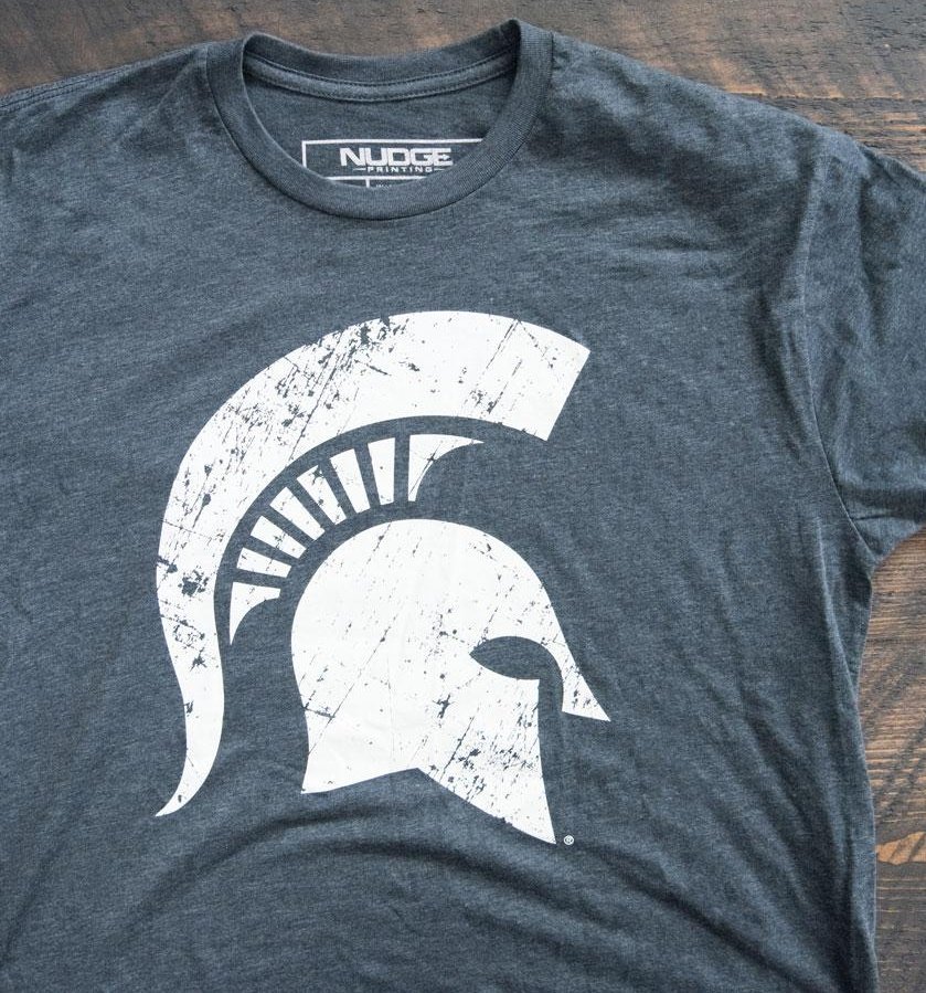 DavidHarns's tweet photo. Mid-Michigan-based Nudge Printing is giving away two $50 gift cards this week. For a chance to win, follow @NudgePrinting &amp; retweet this tweet. They're also offering a "buy one get one 1/2 off" special so you'll get 2, high-quality, licensed MSU t-shirts for $36 w/ free shipping. https://t.co/Y1KgKNNDzb