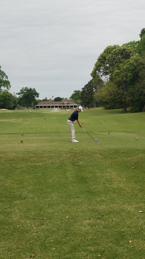 R. Corey teeing off on the 18th in the John Cooper Invitational.