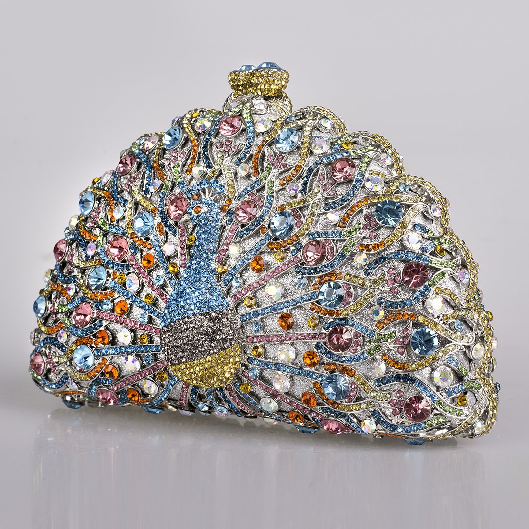 Mockingbird_USA's tweet photo. Peacock Purse #productphotography #gems #purse #clutch #lighting #style #photography #glam https://t.co/ej9yL6Axjw