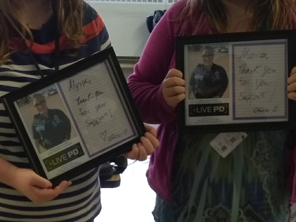 KerryBodenhause's tweet photo. Thanks @OfcAZendejas! LATE on Sat you signed little pieces of notebook paper for two of my students who couldn't attend! I added pics of you for "the best gift ever!" Thanks for being so gracious! Fans for life! @OfficialLivePD @JamesCraigmyle @EPPOLICE https://t.co/ZRf0hiALJ8