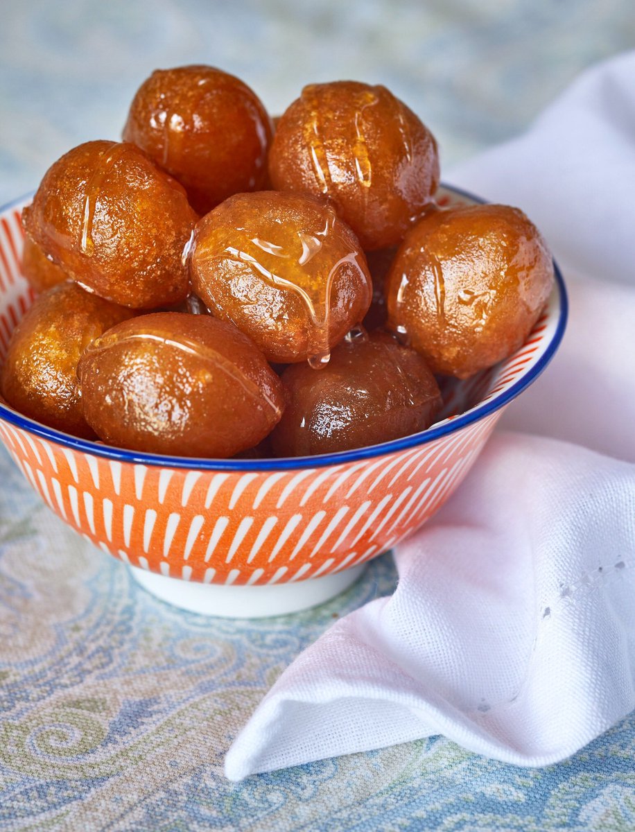 foodauthor's tweet photo. Nothing really represents Ramadan like these 😍 ... these golden crispy sweet balls are so juicy and sweet from the insideI have simplified it for you in my #RamadanExpress book #RamadanCuisine #RamadanExpress #Ramadan2019 #3awamit #ArabicSweets #ArabicDesserts https://t.co/LzClfjMymN