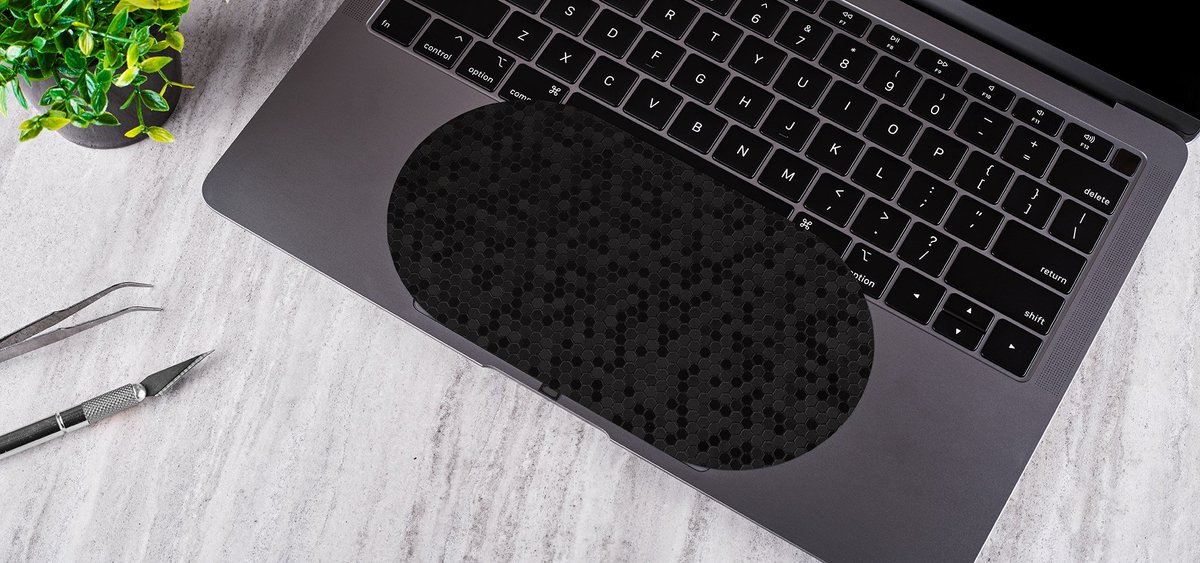 dbrand's tweet image. AirPower skins: making your trackpad as useless as your keyboard.