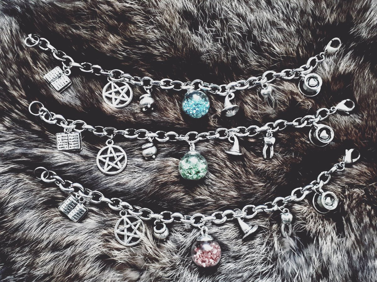 sdobcreations's tweet photo. Witchy charm bracelets featuring metal charms of a spell book, pentagram, cauldron, witch's hat, tooth, mug of coffee/tea, and your choice of blue, green, or red crystal ball.
#charmbracelet #witch #witchcraft #charms #book #pentagram #cauldron #crystalball #witchshat #tooth #mug https://t.co/vFZZaMVXy6