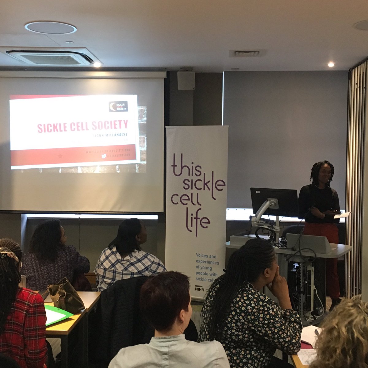 ThisSCLife's tweet image. Siann Millanaise from @SickleCellUK discusses the health, social &amp;amp; wellbeing support involved in their #SOS #selfoversickle work. @LSHTM @RCPCH_and_Us #sicklelife #voicematters #sicklecell #health #uni @DEPTH_LSHTM
