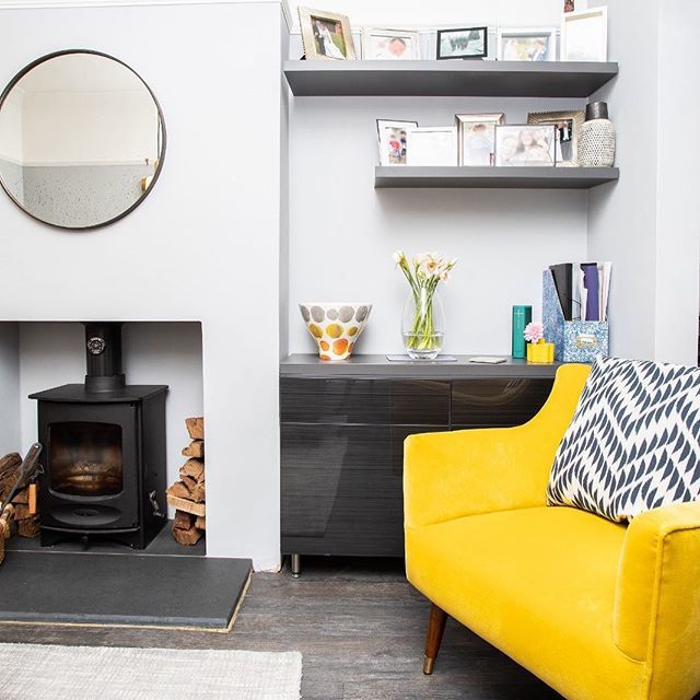 Another shot of our recently photographer family living room - this time showcasing the gorgeous wood burner and bespoke shelving in the alcoves #livingroomdecor #livingroomdesign #velvetchair #yellowarmchair #geometric #cushion #yellow #greylivingroom #… ift.tt/2FIS552