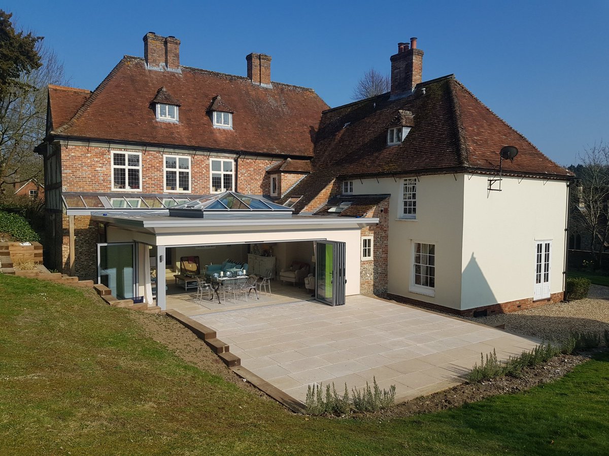 IpcWindows's tweet image. Smarts Visofold 1000 bifold doors and aluminium roof lantern and lean to roof.