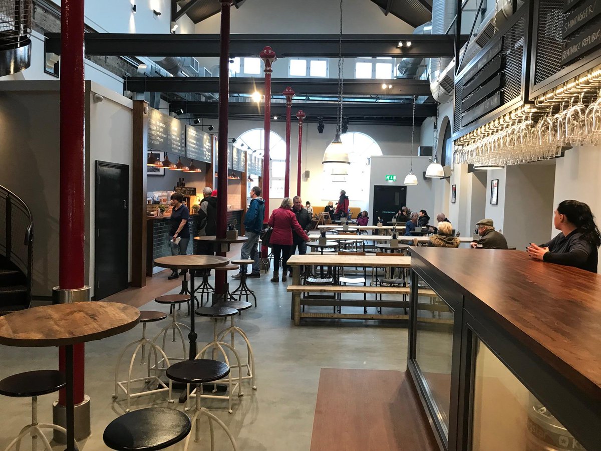 StockportMBC's tweet photo. The Produce Hall has thrown open its doors today and it’s looking amazing! Pies, pizza, tapas, great coffee, a well-stocked bar and more all under one roof, what’s not to like? https://t.co/f9utwwwRdD